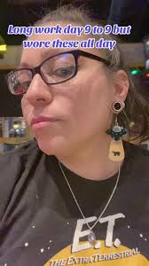 Super long work day but wore my ufo earrings today got them at the at  Spencer’s awhile back #earings #spencers #ufo #cow #et #workhard  #grandrapidsmichigan #space