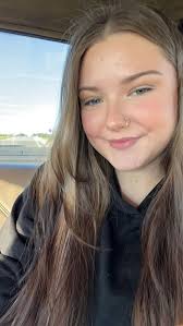 Who can help me change my hair color from black to blonde in Asheville?