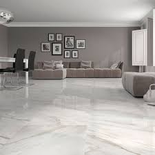 Calacatta White Gloss Floor Tiles Have An Attractive Marble Effect Finish These Large White Floor Tiles Living Room Tiles White Marble Floor Floor Tile Design