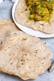 Add chicken to the marinade, cover tightly, and chill for 30 minutes (or longer for even more flavorful results!). Roti Recipe Indian And West Indies Flatbread Tipbuzz