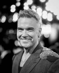 Robbie Williams photographed with his good friend (also a film director)  Stephen Ward last night… From Stephen Ward's page: 'Went to a screening of  Better Man, the highly unusual and brilliant biopic