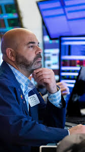 Stocks sink as Wall Street eyes downside of solid jobs data