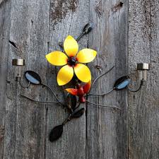 There are many metal flower wall art pieces to disperse positivity in your home. Metal Flower Hummingbird 2 Solar Lights Wall Mounted Flowers Humm Practical Art