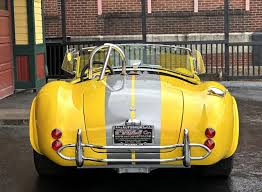 Image result for Canary Yellow 1965 AC Cars