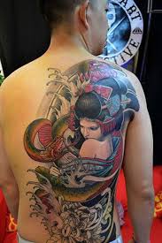 Tylerdfierro@gmail.comfollow my social media for daily updates:instagram: Large Half Colored Half Back Tattoo Of Geisha With Flowers And Snake Tattooimages Biz