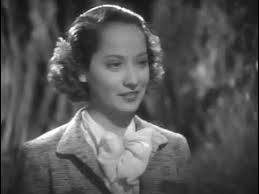 THE DARK ANGEL. Merle Oberon & Fredric March