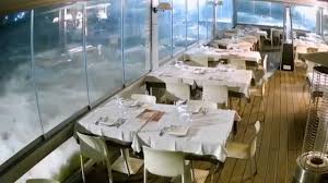 Surge Swamps Restaurant As Storm Harry Hits Italy