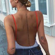 A simple but meaningful design. Girl With Back Tattoos Tiny Tattoo Inc