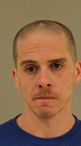 Man hurt in chase charged with murder in girlfriend's death