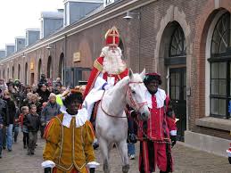 Resultado de imagem para papai noel holandes ajudantes negros