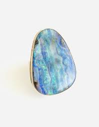 It is easily identifiable because it is a mixture of ironstone and opal either in a matrix or layered. Kiki Jamie Joseph Boulder Opal Ring Kiki