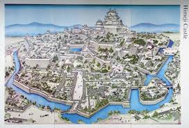 The castle stands in an expansive lawn covered park and consists of a complex network of moats, turrets, and walls surrounding a massive central tower. Old City Maps Japanese Castle Himeji Castle Himeji