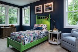 Navy and cream knit pillows like these ones from homegoods add a cozy touch to this master bedroom. Blue And Green Boy Bedroom With Green Bamboo Bed Transitional Boy S Room Benjamin Moore Newport Blue