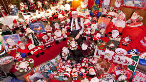 Beautiful embellishments include a felt hat, winter clothing, a bag of presents, and a list. 8 Santa Claus Records That Will Make You Ho Ho Ho Guinness World Records