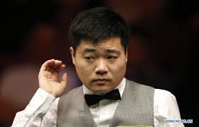 Ding Junhui competes during UK Snooker Championship