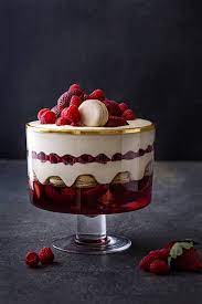 Line a glass trifle bowl with the sliced jelly rolls. Strawberry And Macaron Trifle Trifle Bowl Recipes Xmas Desserts Christmas Cooking