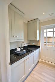Matching Partridge Grey Utility With Black Granite Worktops And Up Stands Designed Supplied And Installe Cosy Kitchen Granite Worktop Kitchen Granite Kitchen