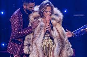 Jennifer lopez demonstrates some moves to constance wu in hustlers. Most Talked About Trailer Hustlers Fur And J Lo How Do These Three Relate We Are Fur