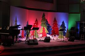 If you make a wall that's climbable, be sure that a child will climb that wall. Stage Christmas Decorations My Web Value Christmas Stage Christmas Stage Design Christmas Concert Ideas