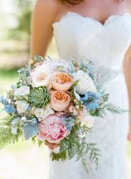 At this charleston, south carolina, wedding, the 'maids carried bouquets of david austin roses, garden roses, astrantia, astilbe, and scabiosa by blossoms events. Finding Love In The Aftermath Of A Storm Blue Wedding Bouquet Wedding Bouquets Bridal Flowers