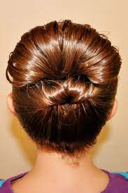 Make A Loose Ponytail And Pull It Through Itself Upside Down Now Grab The Rest Of The Hair And Barrel Ro Hair Styles Topsy Tail Hairstyles Pretty Hairstyles