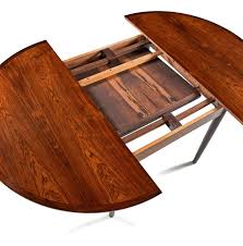 Easily increase size of table to accommodate. Danish Rosewood Butterfly Leaf Round To Oval Dining Table 1960s At 1stdibs