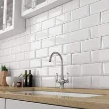 If you'd like to keep it minimalist, go for a white or gray subway tile backsplash. Ceramic White Glossy Kitchen Wall Tiles Size 4 X 8 Inch Thickness 6 Mm Rs 28 Piece Id 22069850088