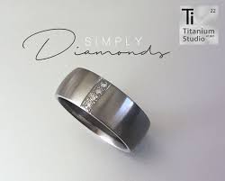 Titanium Mens Ring With 4 Diamonds Set Elegantly In The Centre Simplicity Is The Ultimate Sophistication Titanium With Diamonds And Gems Titanium Rings