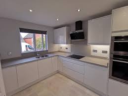 With over 20 years of experience and true passion for quality and beauty, their dedicated teams inspect and ensure premium quality standards of all the products before they are. Remo White Gloss Kitchen With Grey Shimmer 20mm Quartz Worktops Up Stands And Splashback