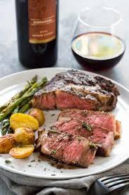 To make it, you'll need beef tenderloin steaks, mushrooms, thyme, and a dry red wine like cabernet sauvignon. Ribeye Steaks With Red Wine Reduction Sauce Jessica Gavin
