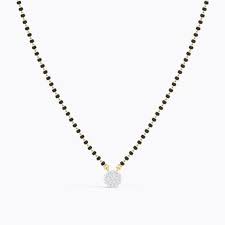 A unique meenakshi work mangalsutra with floral motifs. Buy Diamond Mangalsutra Online Latest Diamond Mangalsutra Designs Caratlane