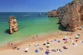 The little port of lagos portugal is nestled in one of the biggest bays in europe, which offers clear and calm beaches with their ochre. Praia Da Dona Ana Beach Atlantic Ocean Near Lagos Algarve Portugal Europe Stock Photo Dissolve