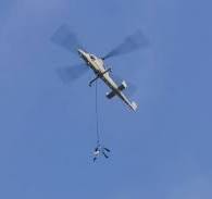 Unmanned helicopter demonstrates impressive cargo airdrop