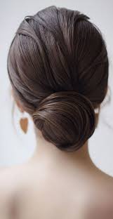 To set off a messier updo, try pairing the style with an elegant red lip for a touch of class. 49 Beautiful Romantic Wedding Hairstyles Low Bun
