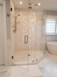 Light Colored Master Bath With Frameless Glass Shower Doors The Free Standing Tub Give Glass Shower Doors Frameless Free Standing Bath Tub Glass Shower Doors