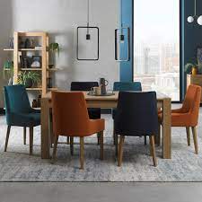 The focal point of any dining room, our solid oak dining tables are made of the highest quality natural oak. Trinity Light Oak Cookes Collection Trinity Light Oak Medium Extending Dining Table Dining Tables Cookes Furniture