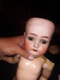 Doll value and repair in Cincinnati Ohio