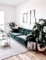 Scandinavian Living Room Green Velvet Sofa With Matching Plants Living Room Scandinavian Living Room Green Trendy Living Rooms