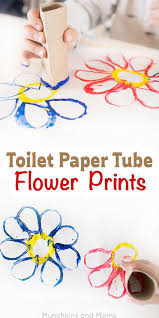 These are great to make for earth day to recycle not only your popsicle sticks but also your paper rolls! Toilet Paper Tube Flower Prints Munchkins And Moms Toilet Paper Tube Toddler Art Classroom Crafts