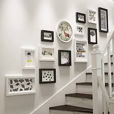 Sold by minizfigs and ships from amazon fulfillment. Photo Frame Collage Set 13 Pieces Wall Mounted Frame Solid Wood Combination Picture Frames Wall Stairs Creative Photo Background Wall Decoration Color Black White Amazon Co Uk Kitchen Home