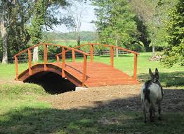 In this instance for such a small tunnel, yeah, but tunnels are often more expensive and time consuming to build than a bridge. Special Order Redwood Bridges Handcrafted Garden Bridges R