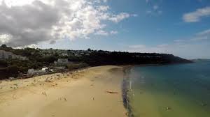 This picturesque bay, located in st ives, offers outstanding views and a magnificent sandy beach offering many recreational activities such as swimming the the views back down onlt to beach as you leave the bay are different again, with st ives' island in the far distance. Aerial View Of Beach And Stock Footage Video 100 Royalty Free 1016363701 Shutterstock