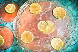 Tequila, orange juice, blue curacao served in a collins glass. 6 Summer Punches To Bowl Over Guests This Memorial Day Bar Restaurant Brought To You By Nightclub Bar Show