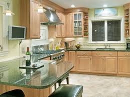 Clintonville Ohio Kitchen With Woodharbor Maple Cabinets Designed By Monica Miller Ckd Cbd Cr P Brown Kitchen Cabinets Pale Yellow Kitchens Brown Kitchens