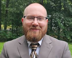 Capron goes 'Red for Ed'