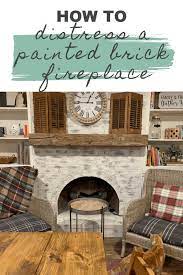 I did not dab the red and pink bricks at all since we wanted that color completely covered. How To Distress A Painted Brick Fireplace Our Re Purposed Home