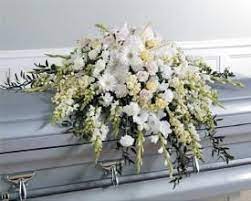 Delivering flowers throughout baton rouge, louisiana. Local Delivery In Baton Rouge All White Flowers Casket Cover Baton Rouge La Florist Same Day Flower Delivery For Any Occasion Funeral Flower Arrangements Casket Flowers Funeral Flowers