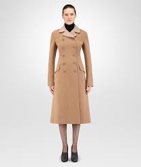 If you can't get enough of a trench shape (large lapels, double breasted, air of british aristocracy), but need something warmer, this harris wharf coat is a good bet. Bottega Veneta Camel Wool Coat