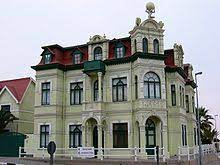 People hold banners as they stage a protest in windhoek, namibia, friday may 28, 2021. German Namibians Wikipedia