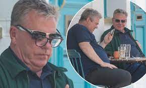 In 1996, madness played the final madstock and announced they planned not to reunite for future concerts, but by 1998 they were back on the road, with a los angeles date recorded for release as universal madness the following year. Madness Suggs 59 Wears Spectacles Over His Sunglasses As He Scrolls Through Phone Daily Mail Online